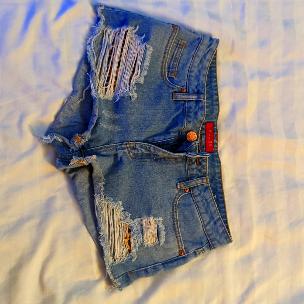 Guess jean shorts with leopard pocket liner size US 27